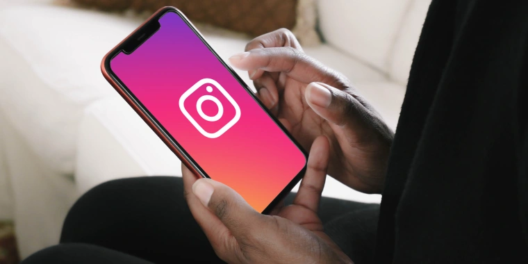 Person using instagram on smartphone to make fast decisions